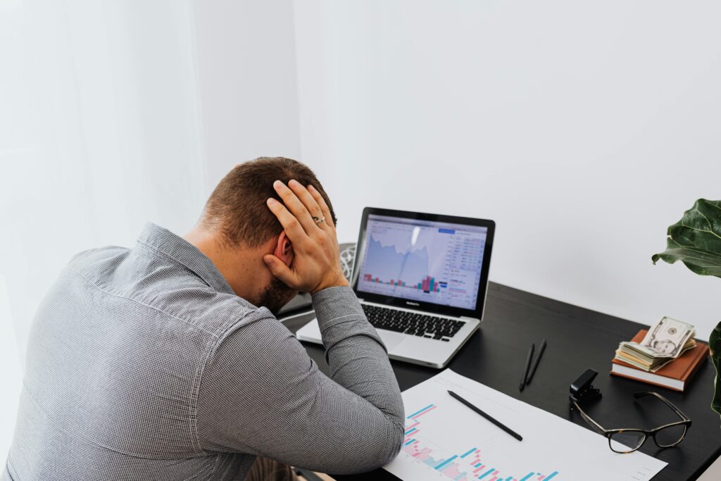 Overwhelmed founder experiencing stress while working alone