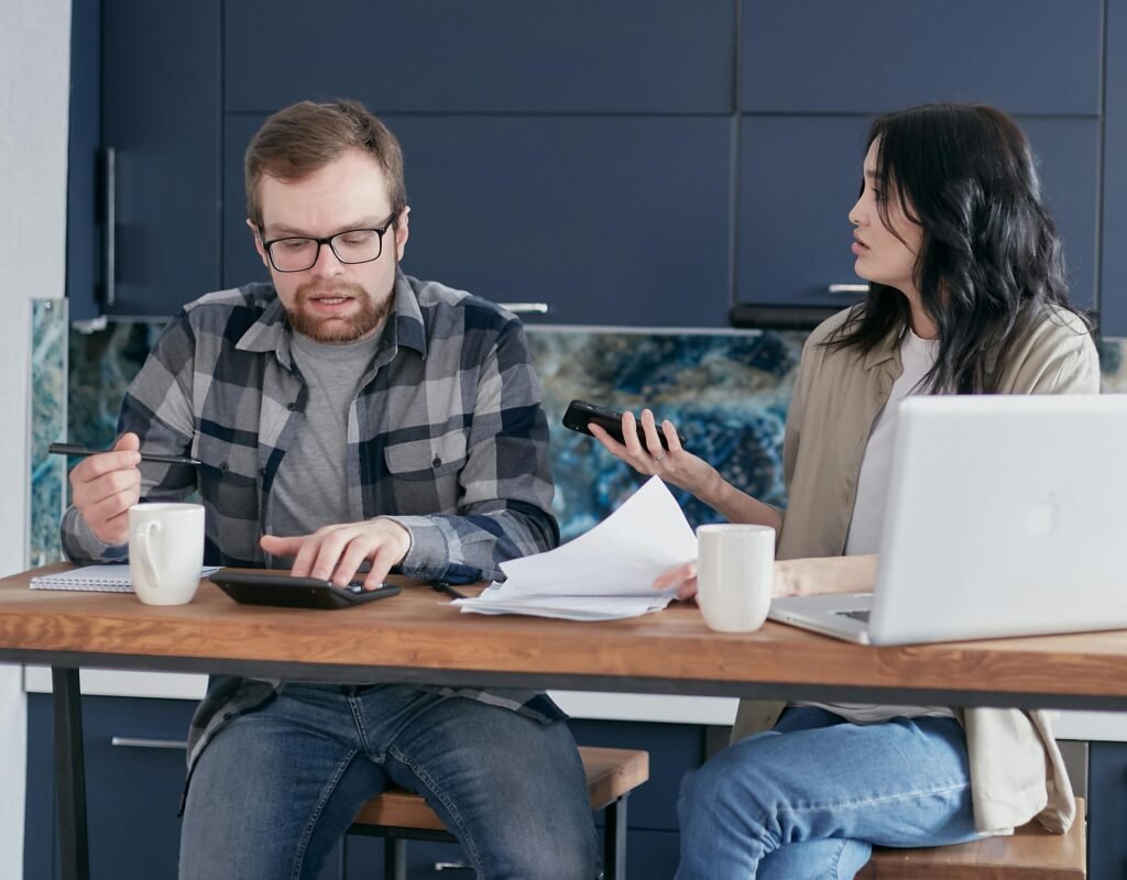 Two co-founders discussing conflict during professional services productisation